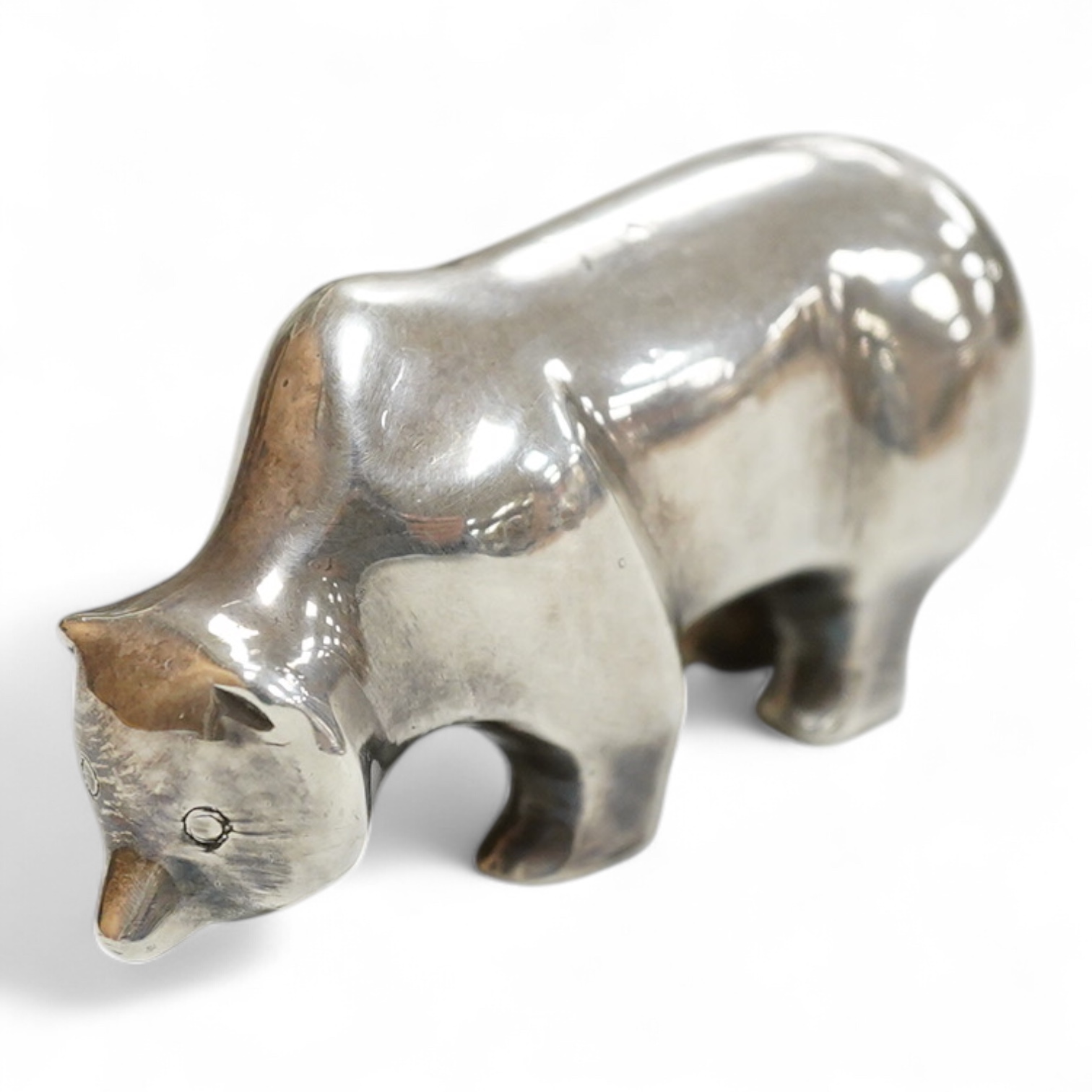 A stylised white metal(stamped 925) miniature model of a bear, length 85mm, height 42mm, 18oz.